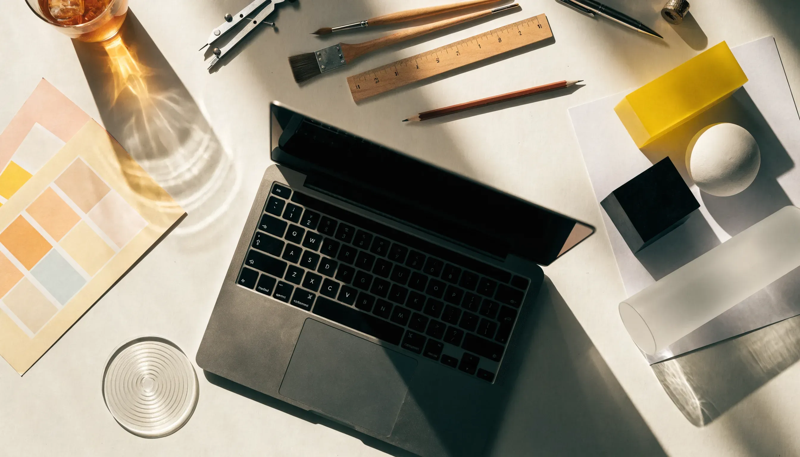 Best Canva alternatives design tools workspace with laptop and creative elements
